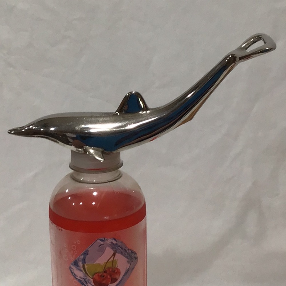 Cast metal Dolphin beer & bottle opener